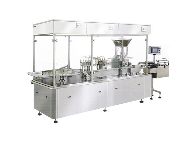 Vial filling and sealing machine